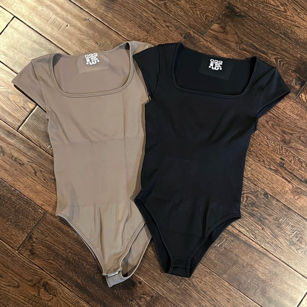 Pair of bodysuits. Size Small.